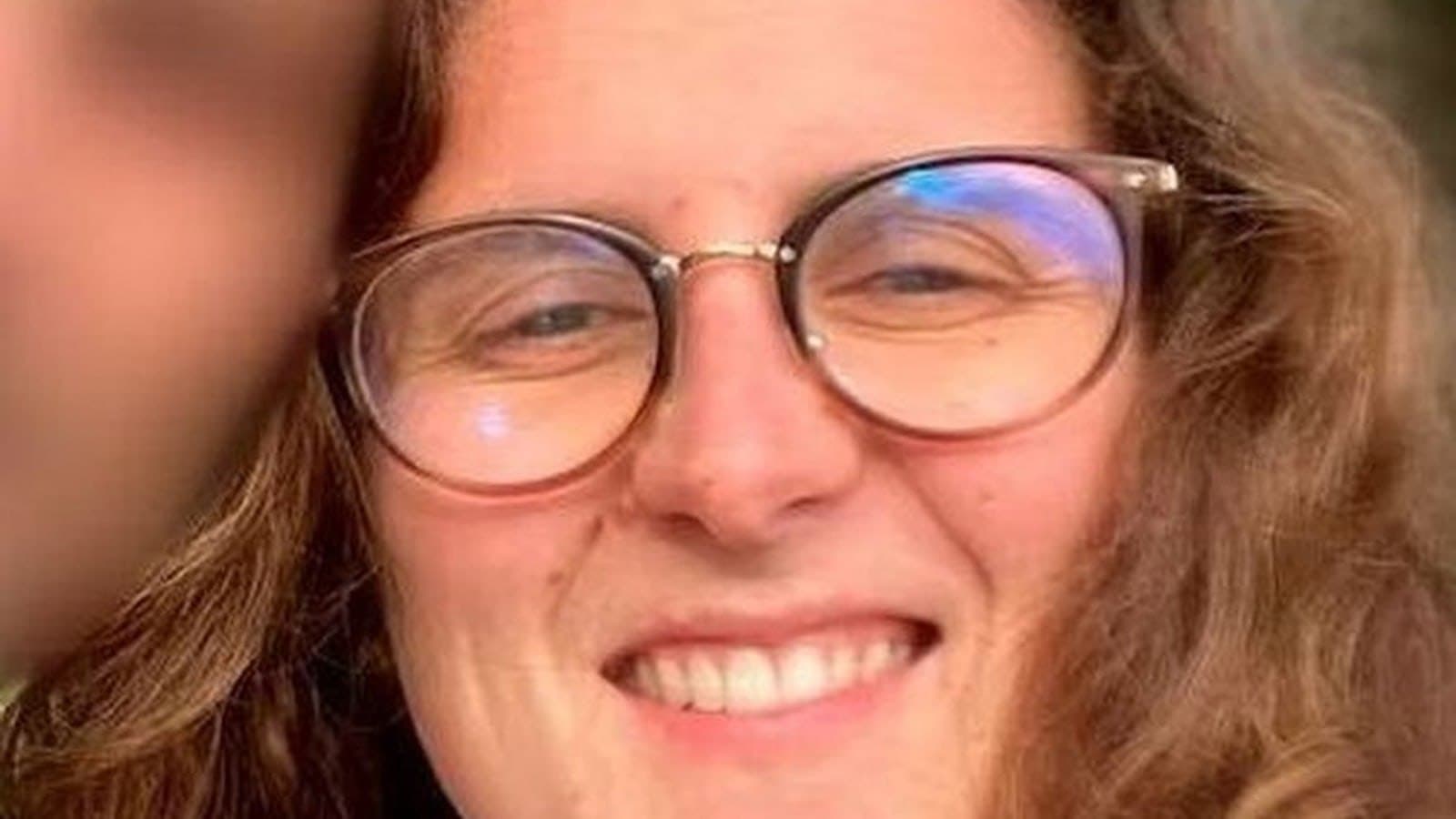 Manon Relandeau, photographed smiling and wearing glasses.